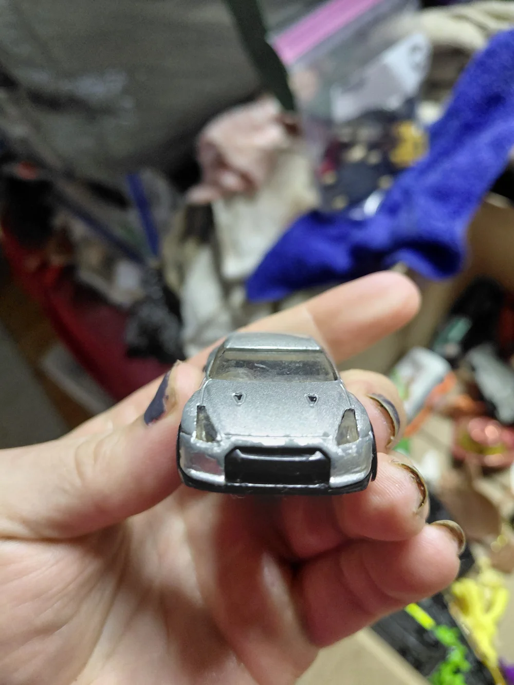 1:64 scale Hot Wheels 2009 Nissan GT-R (R35) die-cast car.